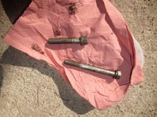 Top starter bolt at the top; bottom starter bolt at the bottom of the photo