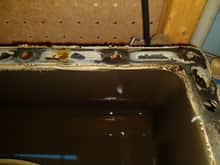 Oil pan - you can see a little pool of oil there, so gotta make sure that's taken care of...