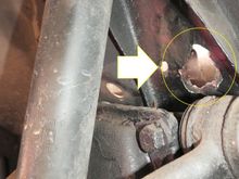 I made this hole after finding 'swelling' on both sides - both sides of my car were affected