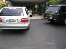 All the boys hanging in the driveway