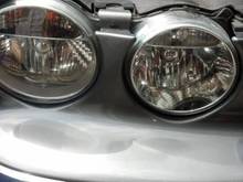Refinished R side headlight lenses to remove the cloudiness. I added a materials list, procedures, and step-by-step How-To for anyone who's interested.