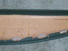 Lower portion of top piece stretched and glued in place