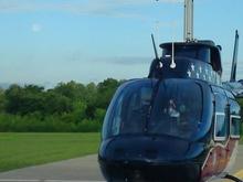 N19AE at AE 75, Dyersburg, TN.
Moon is visible under the rotor blade as it sets to the west.