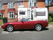 100 1406 side view of my car i stated getting motor homes