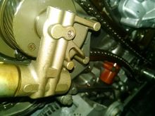 You can see the VVT unit on the right bank here along with the primary chain, guides, and tensioner.