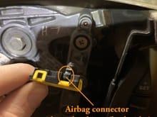 Airbag connector side pushy things vs my clearly enormous fingers (yep, just regular size).