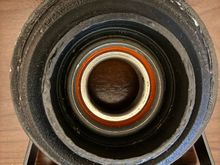 Old center bearing rubber drooping down towards the nut side.