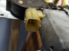 This is where power connects to window motor