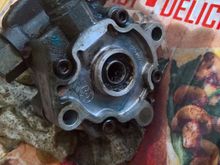 You can see the hole built into the bottom of the pump, that's a UK Pizza box by the way..