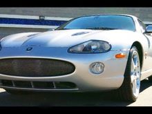 2005 Jaguar XKR - Supercharged with R Performance/Handling Package.  Platinum Paint & Charcoal Leather interior.              20 inch "Detroit" BBS Wheels. Brembo Brakes & Calipers.  Modified Quicksilver Exhaust.       #520 of 660 coupes produced in 2005.                                           Total run of XKR coupes was 9,669