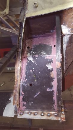 Box support for B post welded and seam sealer applied
