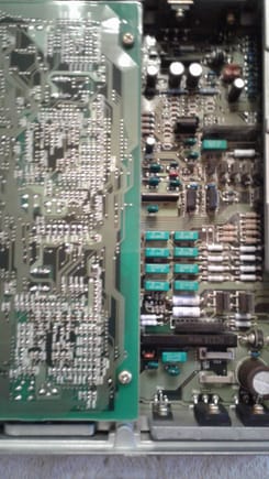 The unit was factory sealed and looked brand new. I was looking for leaky capacitors or burned traces but this 20 year old board looked cleaner than my PC at home.