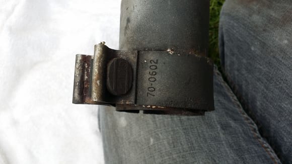 Bloomin clamp. Spot welded in two places onto pipe. Not comming off