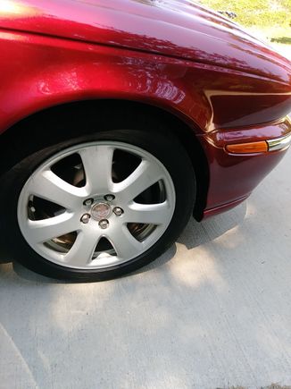 passenger side front wheel tire