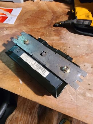 Driver's side SCM with lid repaired and mounted to bracket. Seam is taped--not for attachment but for moisture-proofing.