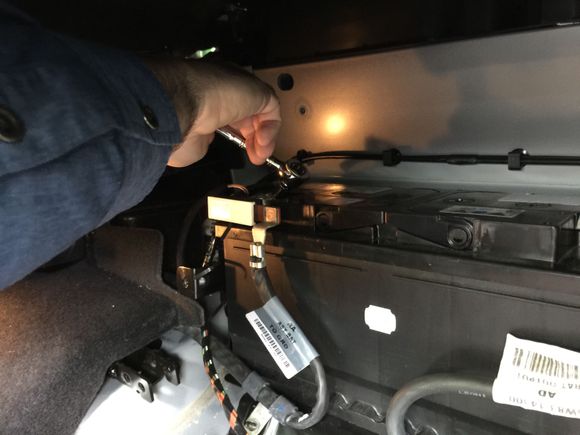 24. Now. we pull off the cables.  Negative cable first.  This would be the time to make sure your battery charger is connected into the trunk connector to save your clock etc.