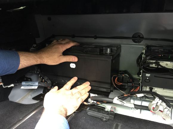 28. Now the battery can lift up on the ledge.