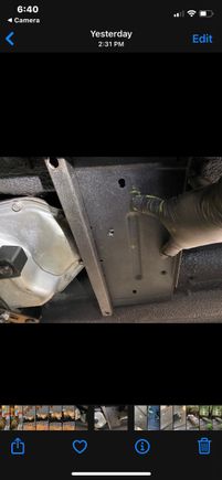 The stock cross member with reinforcing square tubing seen 