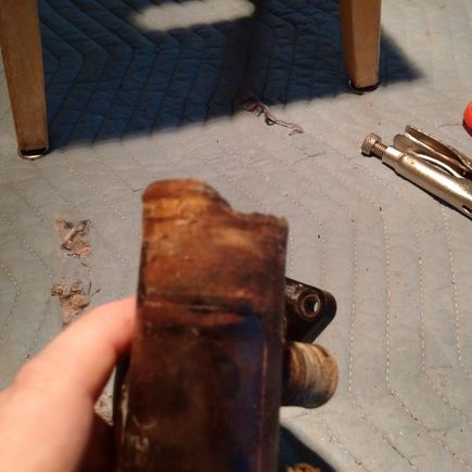 Upper radiator hose end. Again, light finger pushing