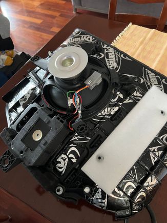 You will need to remove both the speaker baffle and the speakers and brace form the car