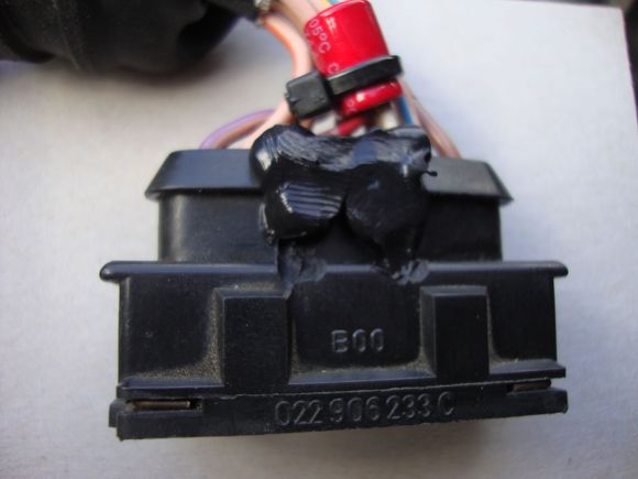 Black silicon applied before replacing rubber cover.