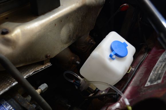 fitting a new washer bottle - wouldn't fit in usual place.