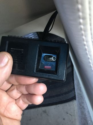 Hanging out of dash driver side