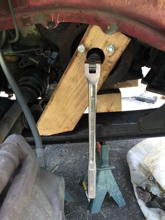 Here the home made crank pulley lockerI put it in used, The car was on jack stands, I have to lay on the floor and used my leg to push the breaker bar handle, I got the job done.