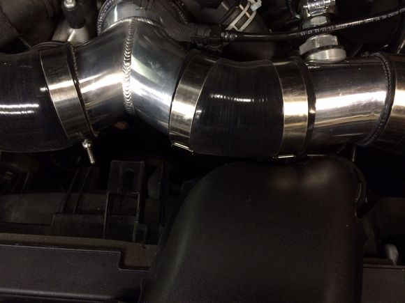 Penty of room for the pipes, clamps, and silicone. Nothing touches.