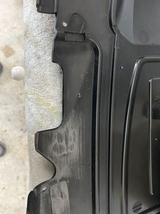 Cut  off extra ear with my right angle grinder and a thin cut off wheel. Ground supply slots in each end. 