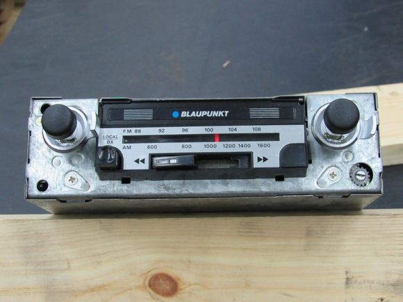NOS radio I purchased  years ago. Apparently not single DIN. Not '60's period. I will confirm it fits.