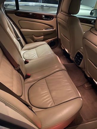 Left rear seat appears discolored in the photo; it is not.  I took this shot in the garage, and that's just fluorescent lighting coming in through the window.