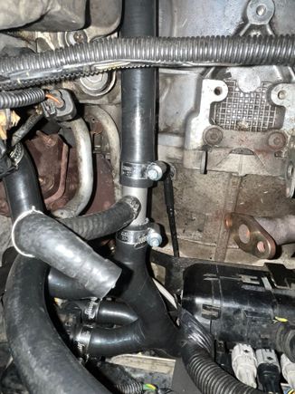 The left side valley hose connects to the metal-three way connector and the octopus hose. 