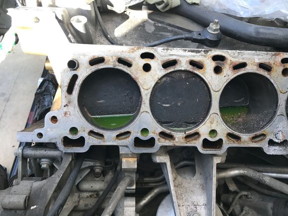 left side of engine... as you all may see the ports ARE rusting.....I'm scared that this thing will be to corrode. and useless engine is something I can not afford.  And there is no way i can get rid of my black beauty