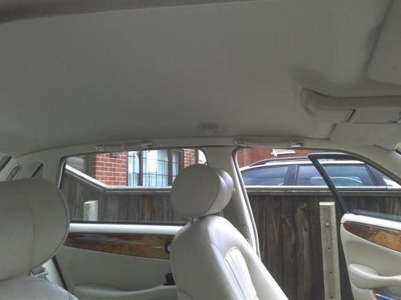 The final result. Sourced the material from a local fabric shop. Quite a good match to original colour.