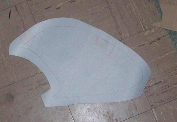 Trimmed vinyl to about 1 inch beyond template outline