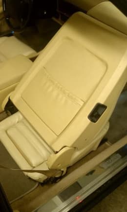 Rear of seats showing hard plastic cover as fitted to facelift cars