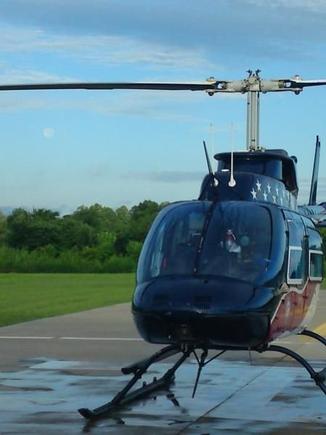 N19AE at AE 75, Dyersburg, TN.
Moon is visible under the rotor blade as it sets to the west.