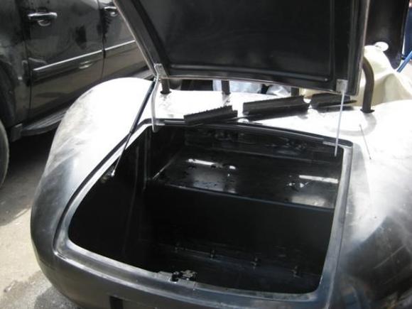 5 2
Here i have fitted the trunk, trunk hinges, and the latch.  Boy was it difficult to get the carbon fiber panels to line up with any precision at all.