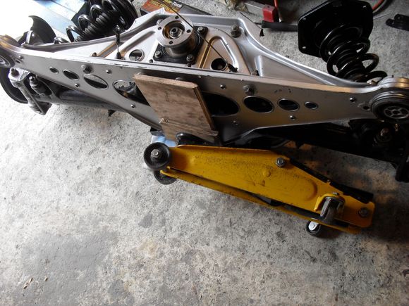 The whole assembly can then be rolled over onto the trolley jack wheels.