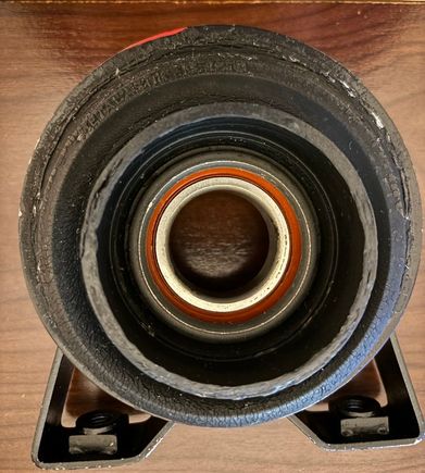 Old center bearing rubber drooping down towards the nut side.