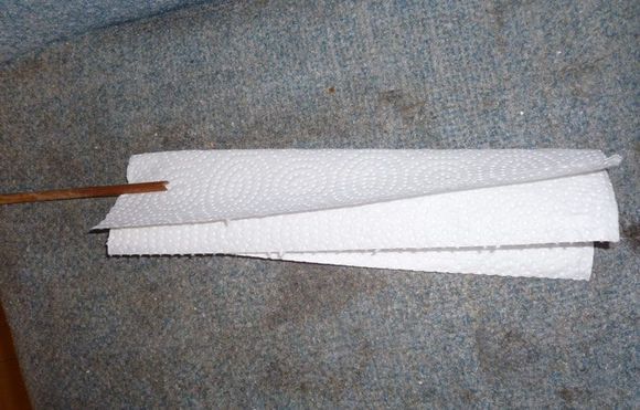 bamboo stick, split, paper towels impaled!