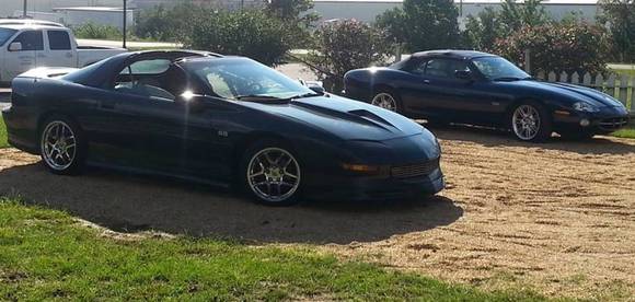 Both Cars together.. I was installing a new DVD player into the SS. Still a nice ride 21 years later.. Sounds incredible.