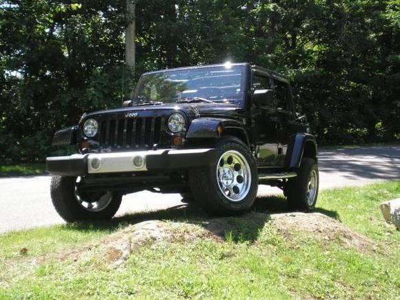 My Jeep JK on a small rock