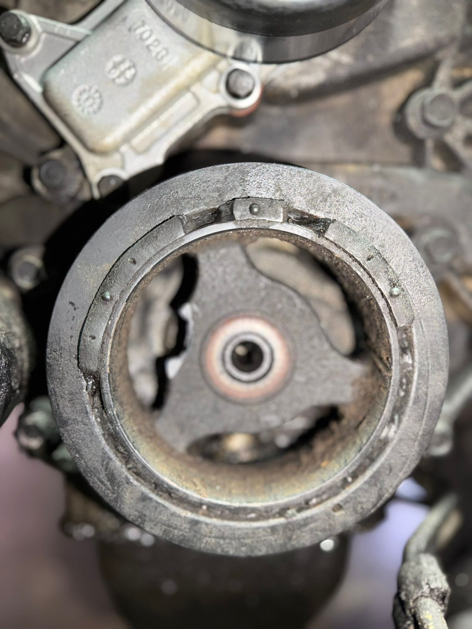 Harmonic balancer with missing puller lobe.