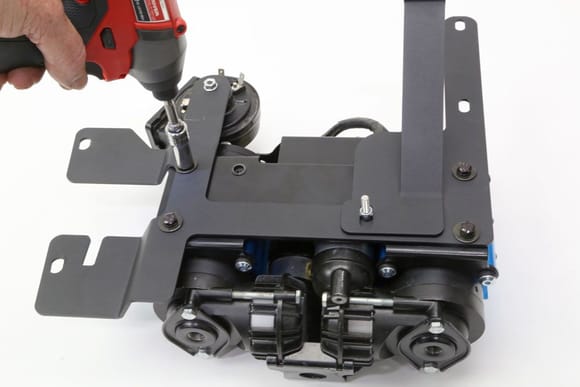 Remove the bracket and bolt up to the bottom of the ARB Twin compressor.