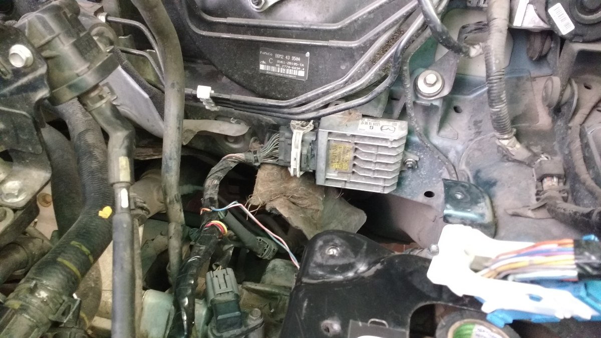 Change the location of the Gearbox computer mazda 3 2 AT