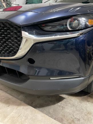 Purchased a 2020 Mazda CX-30 for my son in July, and noticed today that we lost this cover at some point (see hole on front) I’d like to order replacement, but have no idea what it is called.  Can anyone help?