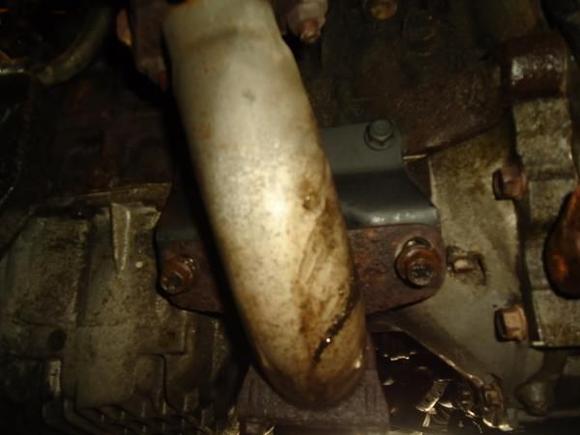 INSTALLED FRONT EXHAUST PIPE BRACKET