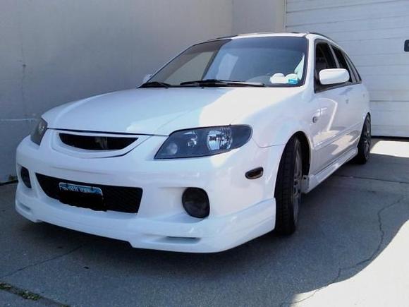 Front lip, Black headlights, tinted fogs, new grille, new 18's